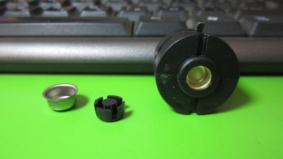 Кнопка для ліхтаря 24мм задній контакт з насадкою чорна (12660)